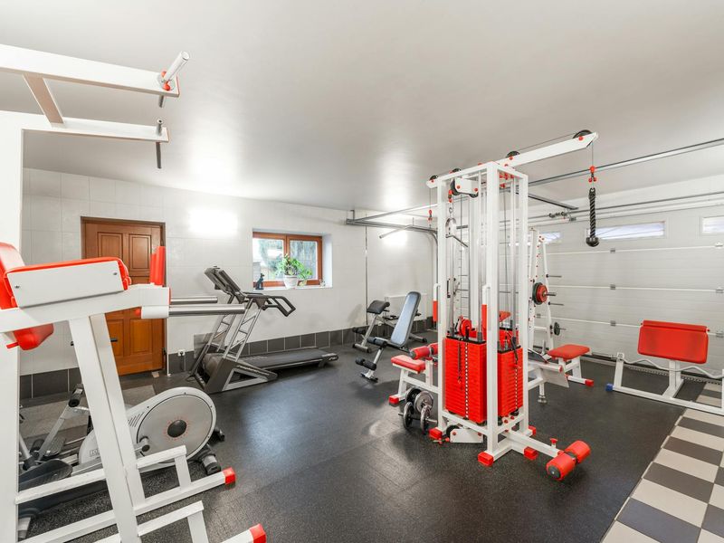 Bright and clean gym interior with minimal equipment